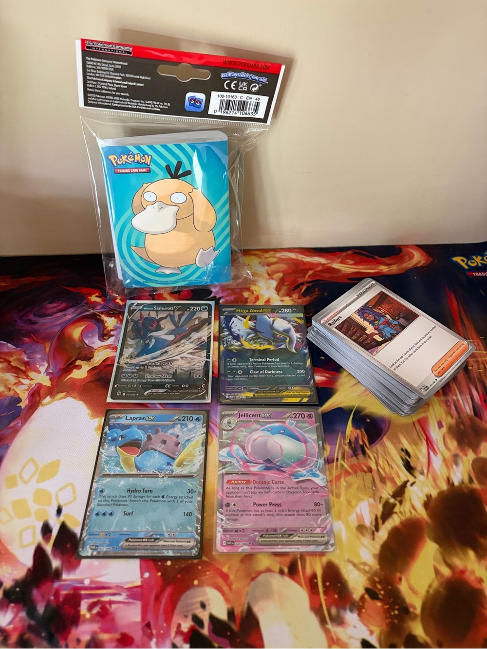 Psyduck Pokémon Mini Binder + Mixed Pokémon ex Cards